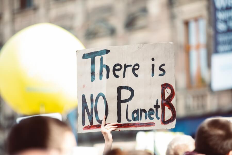 Klimata pārmaiņu protesta plakāts