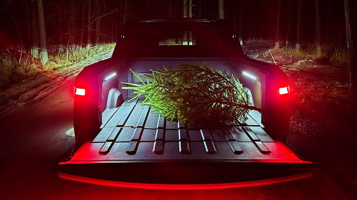 Rivian R1T with Christmas tree in it